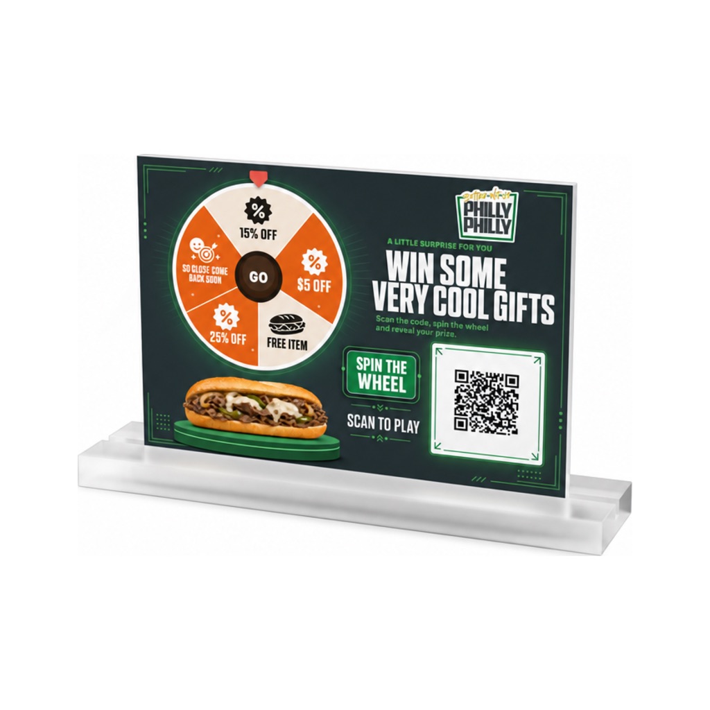 Cheesesteak shop table tent with prize wheel and QR code